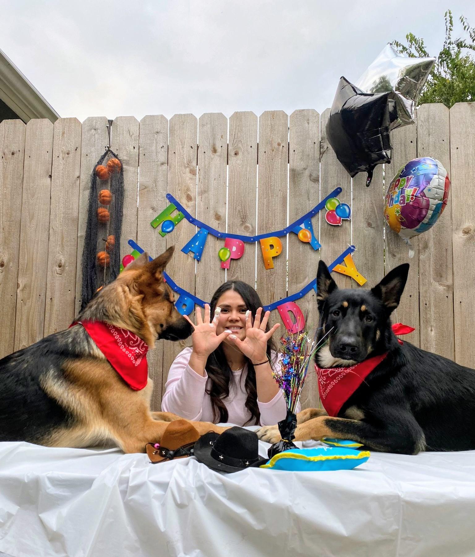 German Shepherd family — Júpiter and Plutón with their owner Esmeralda